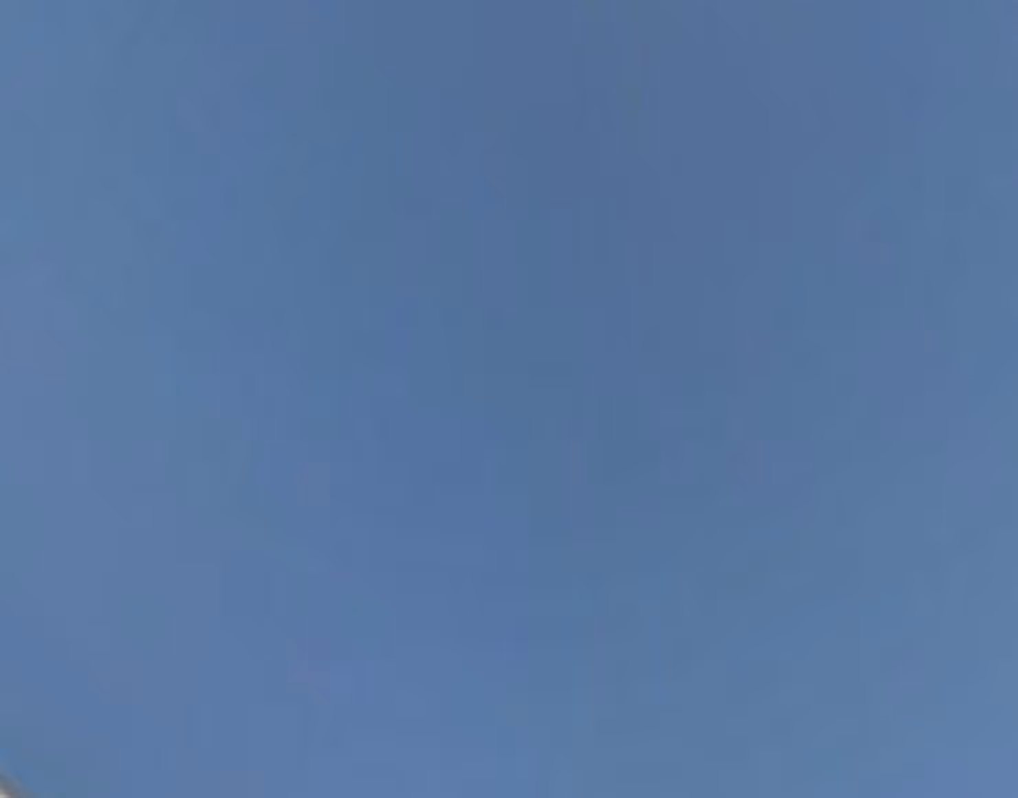 An abstract photograph of a cloudless blue sky.